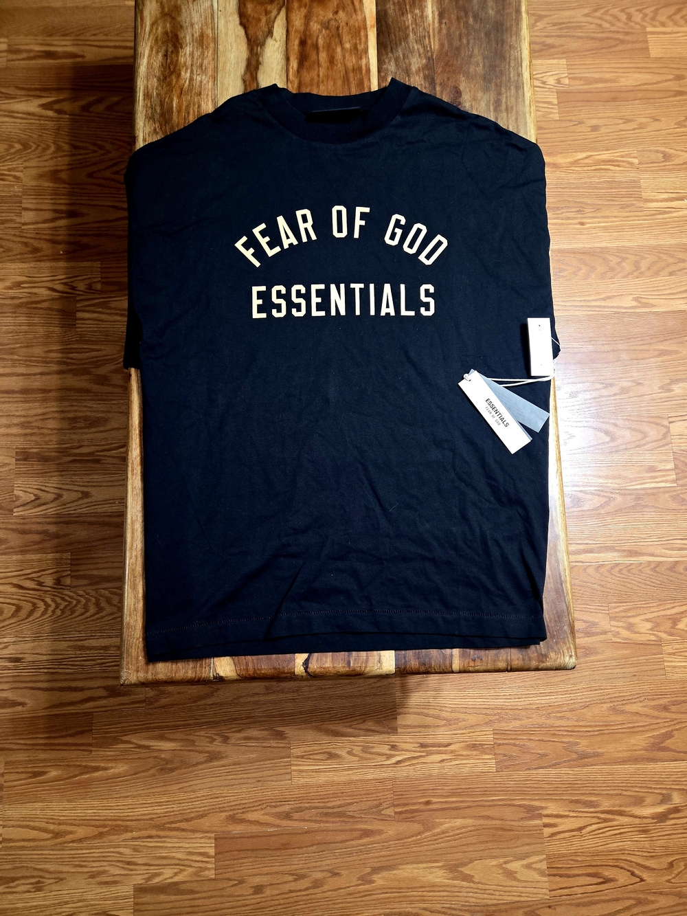 Fear of God Essentials Black Tee with Cream Logo